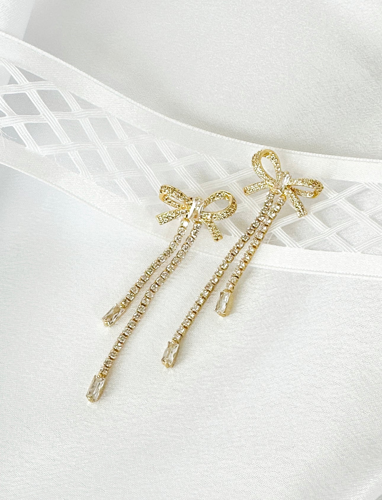 Gold Bow Kissed Statement Earrings