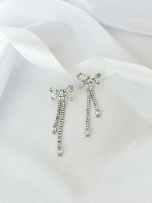 Silver Bow Kissed Statement Earrings